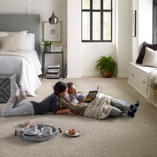 Kids reading on bedroom carpet from Southwest Floors in Seven Hills, OH