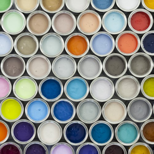 Many different colored cans of paint from Southwest Floors in Seven Hills, OH